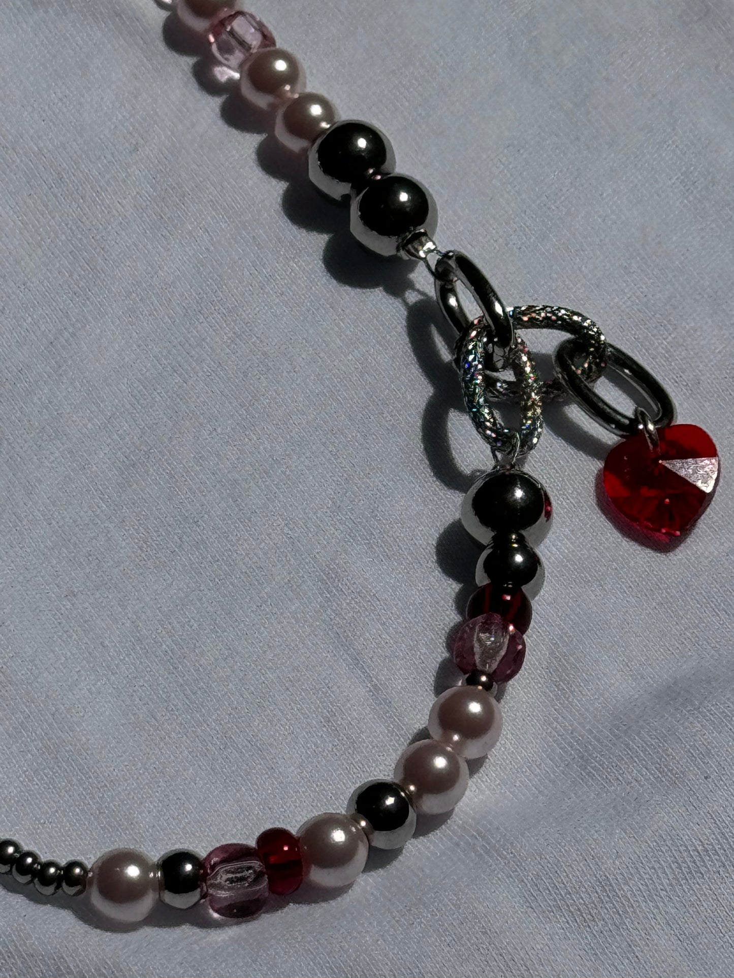 Perlenkette rosa rot mit Herzanhänger