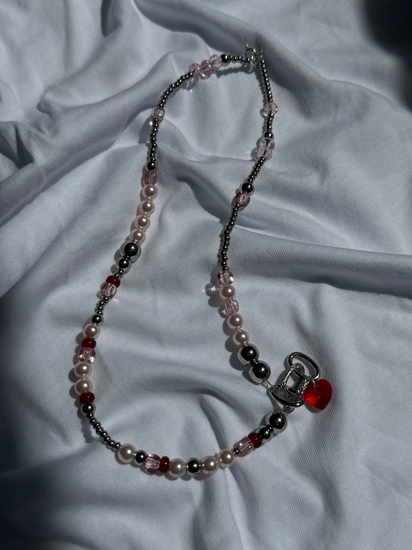 Perlenkette rosa rot mit Herzanhänger