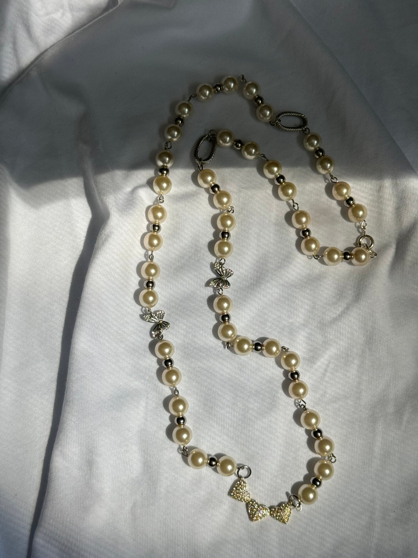 Perlenkette lang mit verschiedenen Sterling Silber Anhängern
